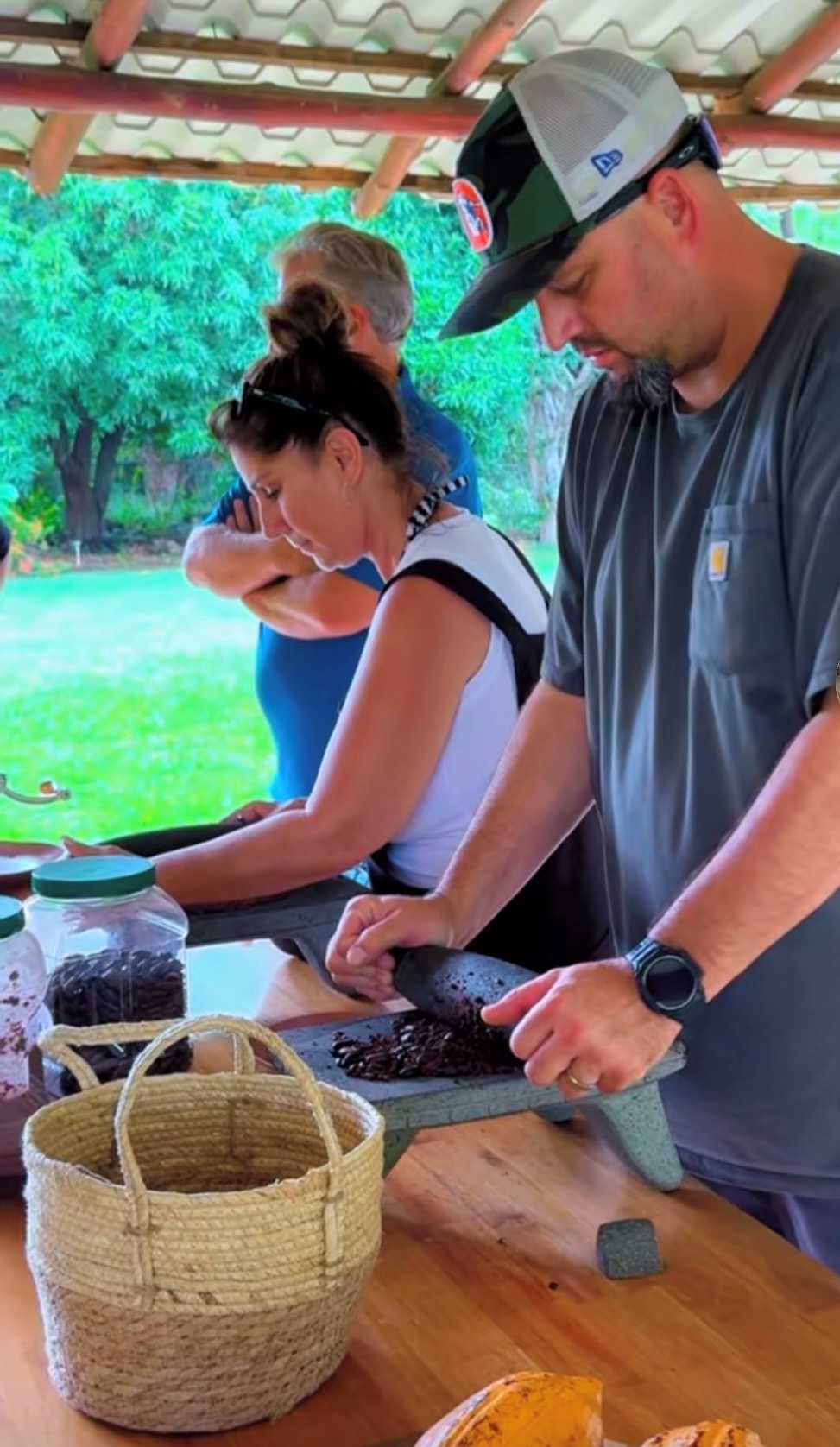 President’s Club guests taking part in a Costa Rican chocolate-making experience