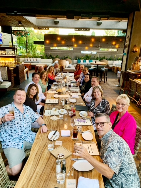US Mortgage team gathering around the table