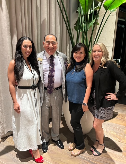 US Mortgage colleagues together at an industry conference