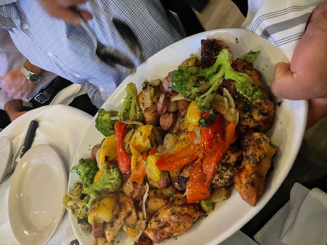 A shared meal during a US Mortgage corporate gathering