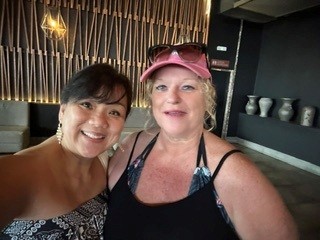 Friends sharing a President’s Club moment