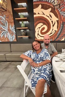 A couple relaxing together at a President’s Club event