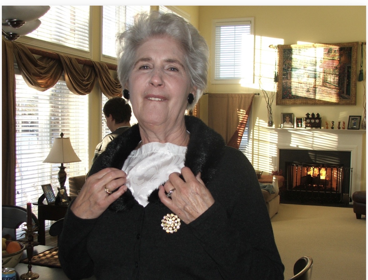 Cathy’s mother smiling at home
