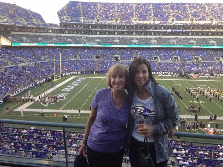 Denise and her mother together at a Baltimore Ravens game