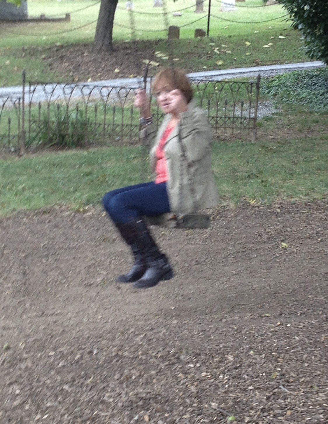 Denise’s mother enjoying a swing outdoors